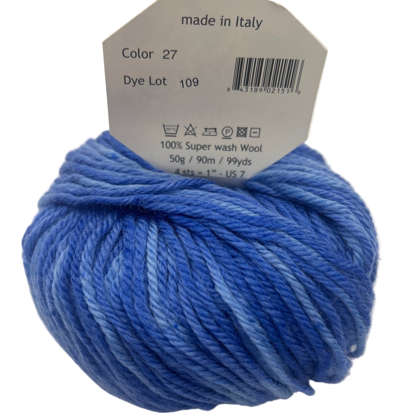 Blue skein of yarn with a label indicating 'made in Italy' on a white background