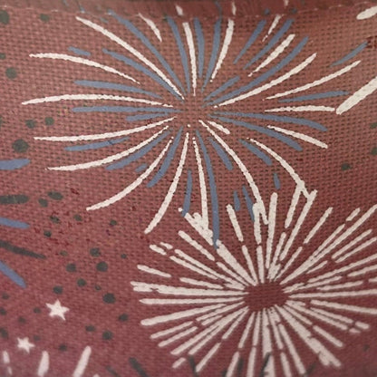 Pattern of starburst shapes on a red background