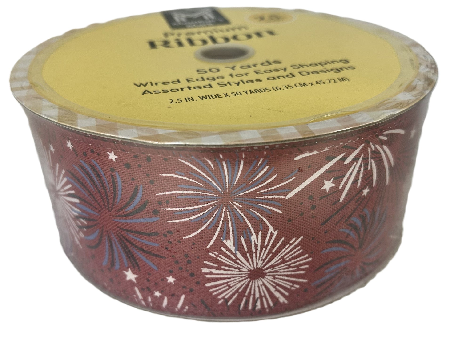 Container of ribbon with fireworks design on a white background