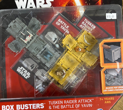 Star Wars toy set in packaging with Tusken Raider and Battle of Yavin elements.