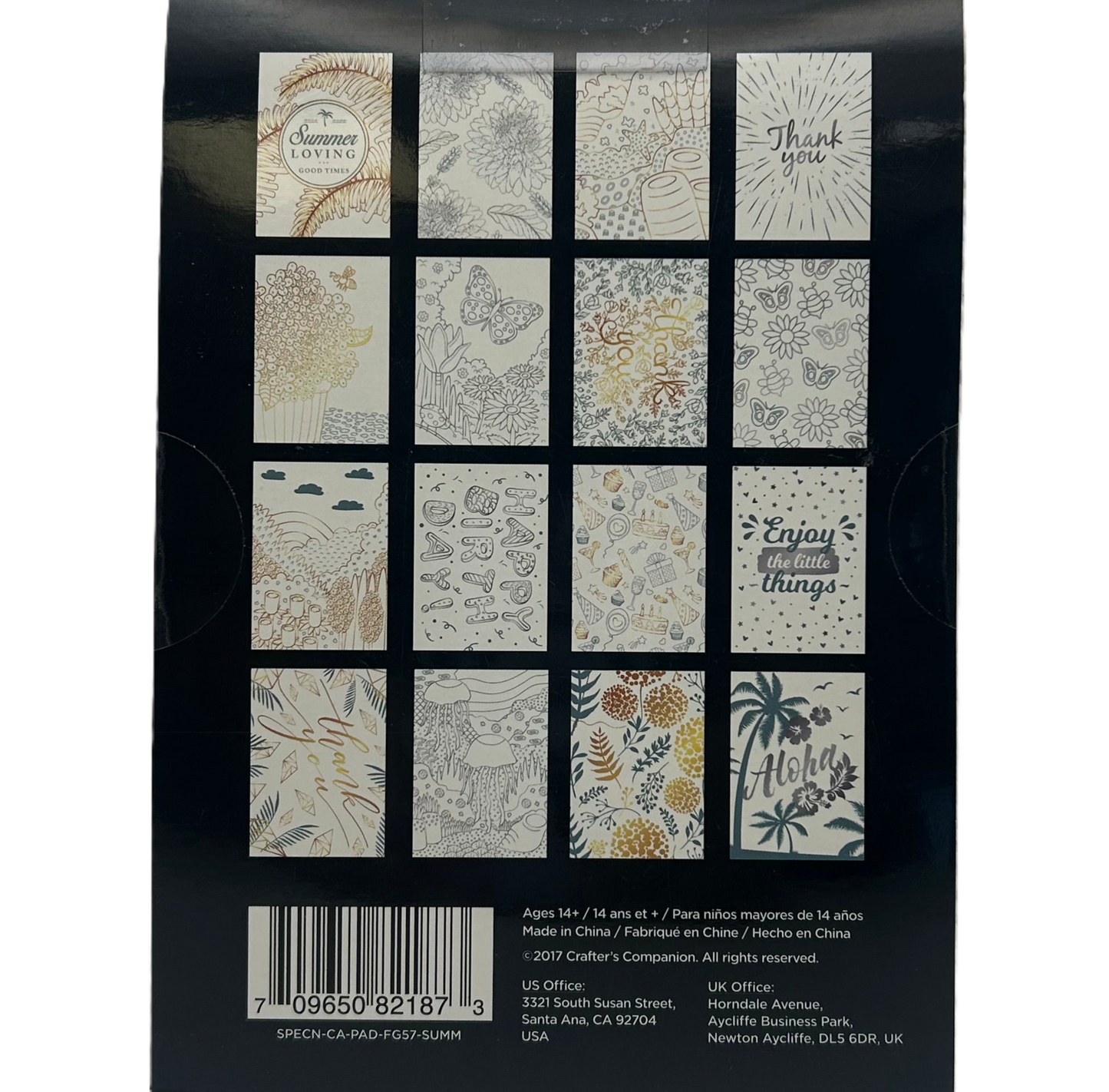 Packaging of patterned cards with various designs on a black background