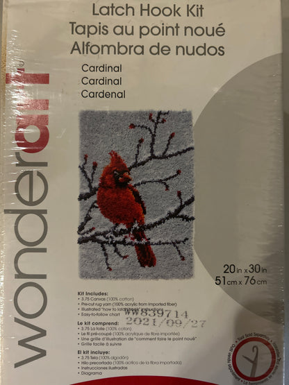 Wondershop latch hook kit packaging with a red cardinal design on a gray background