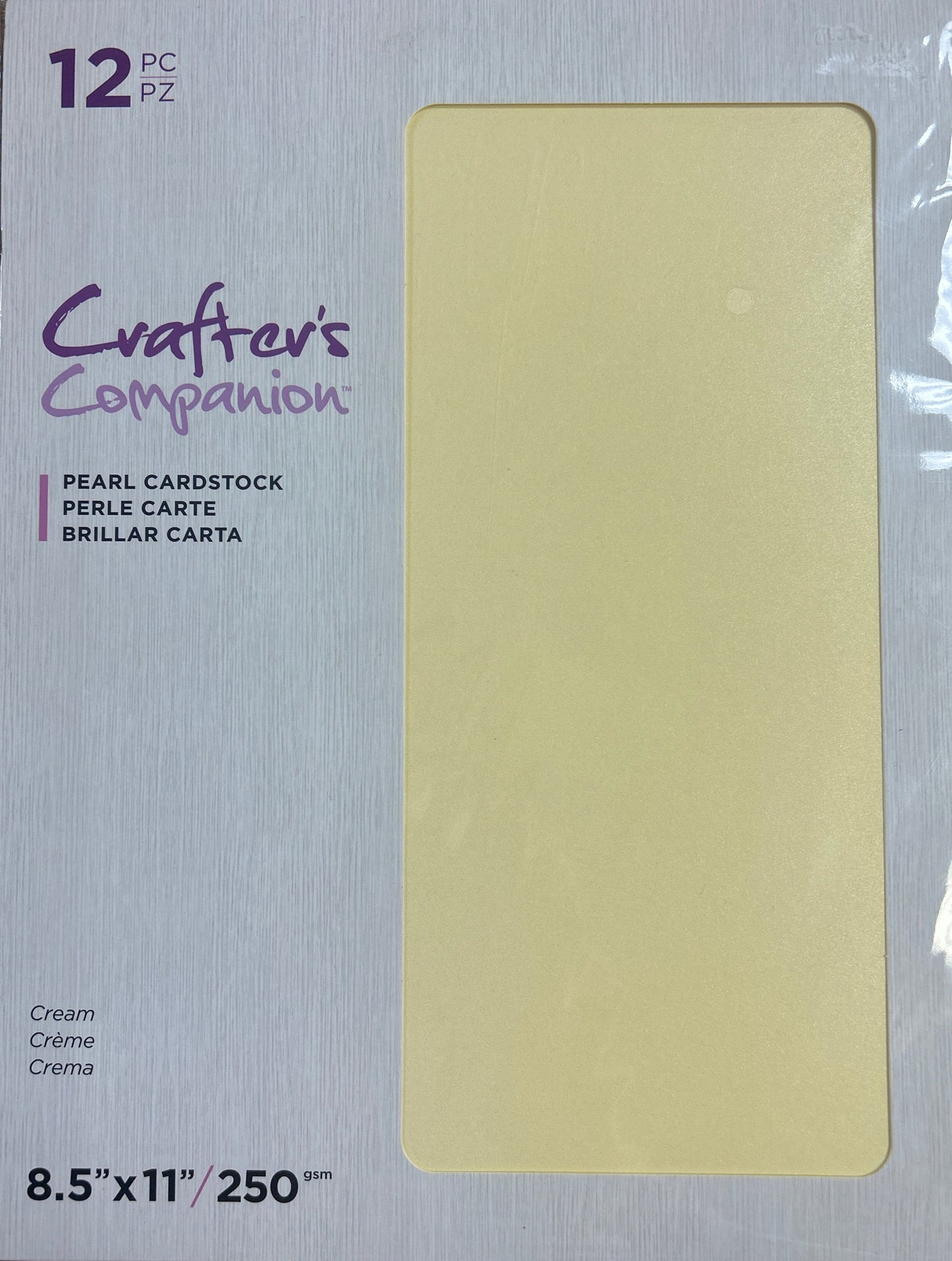 Package of Crafter's Companion pearl cardstock on a wooden surface