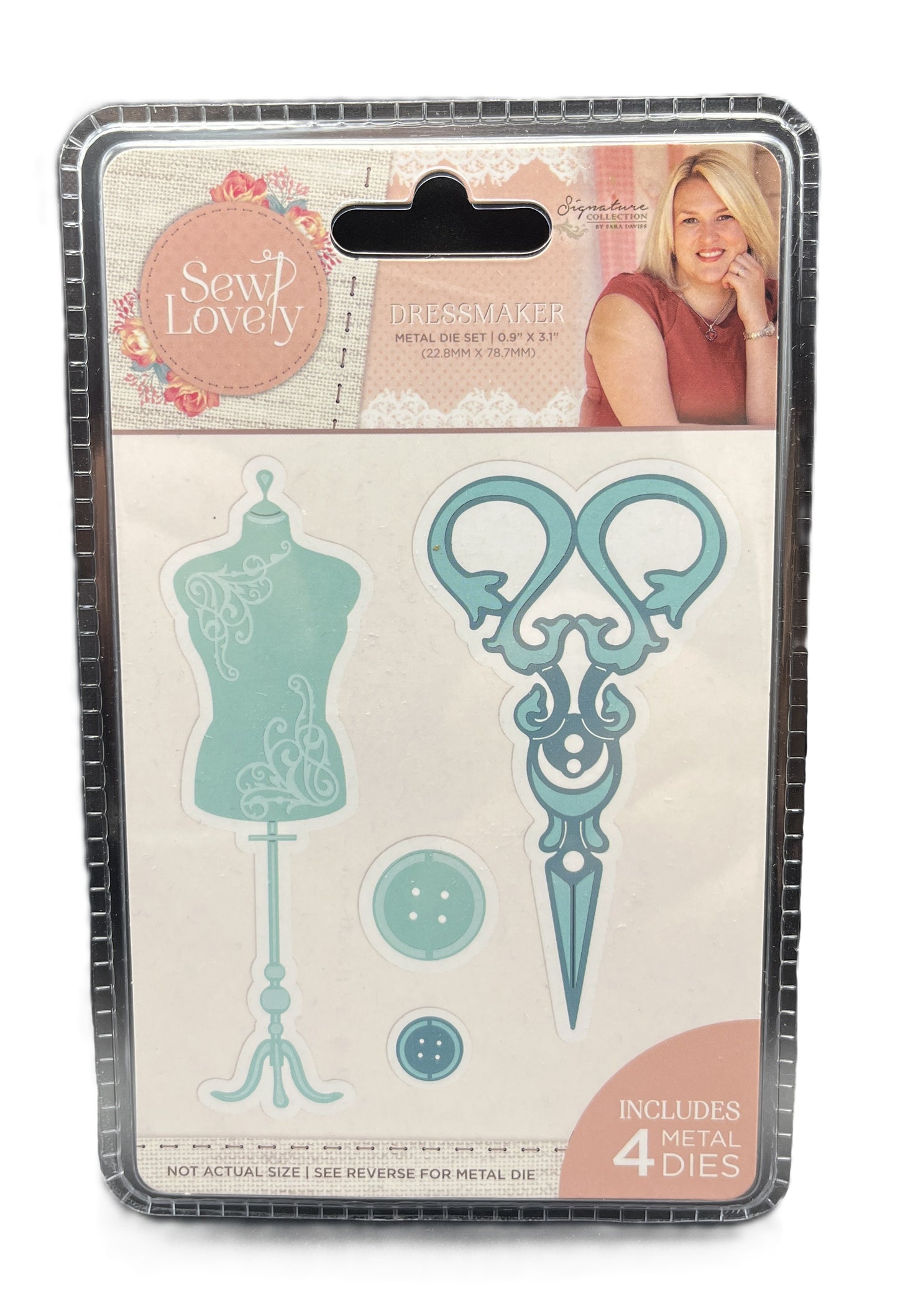 Packaging of sewing-themed die cutters with a mannequin, scissors, and buttons on a beige background.