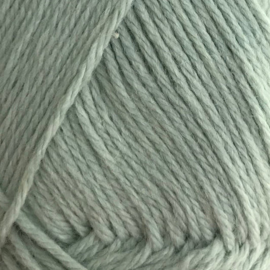 Close-up of a ball of light green yarn