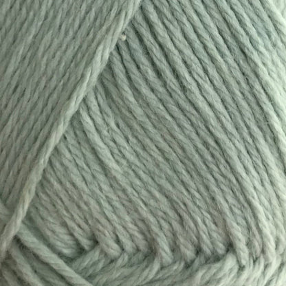 Close-up of a ball of light green yarn