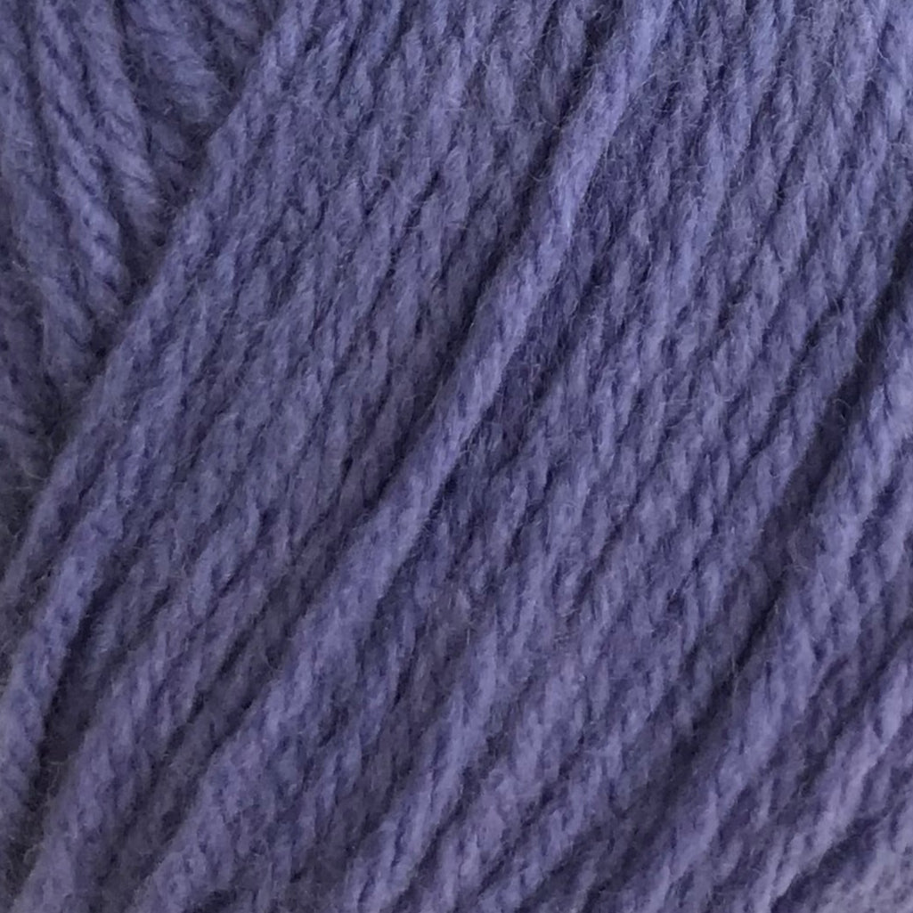 Close-up of purple yarn with a textured pattern