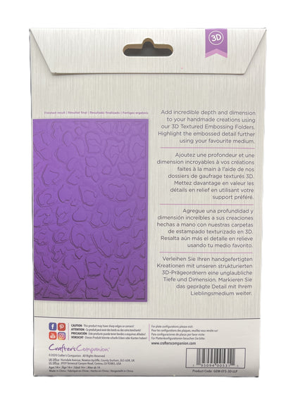 Back view of a textured embossing folder packaging with purple embossed design on a white background.