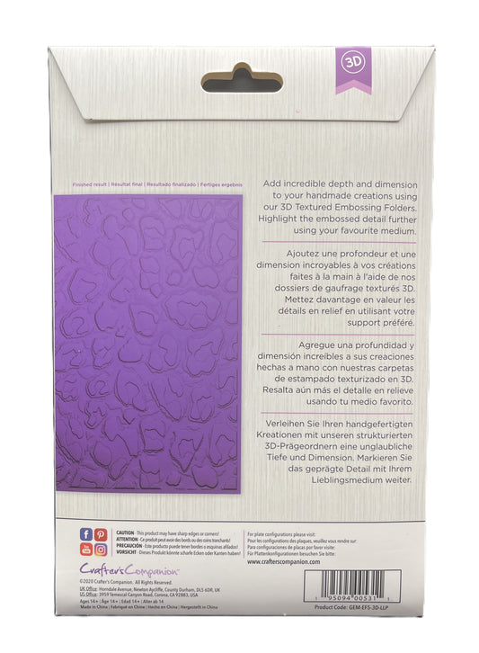 Back view of a textured embossing folder packaging with purple embossed design on a white background.