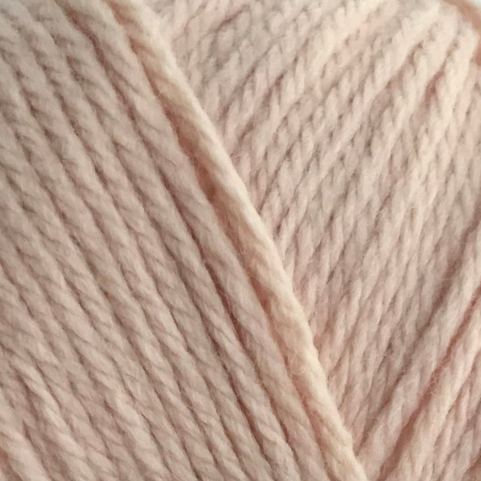 Close-up of beige yarn strands