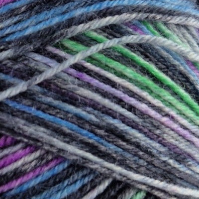 Multicolored skein of yarn with a label on a white background