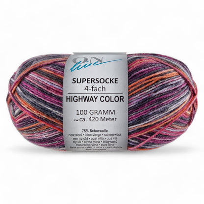 Multicolored skein of yarn with a label on a white background
