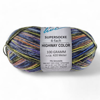 Multicolored skein of yarn with a label on a white background