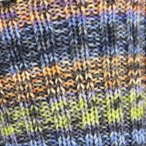 Close-up of a textured fabric with multicolor pattern