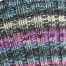 Multicolored striped sock on a white background