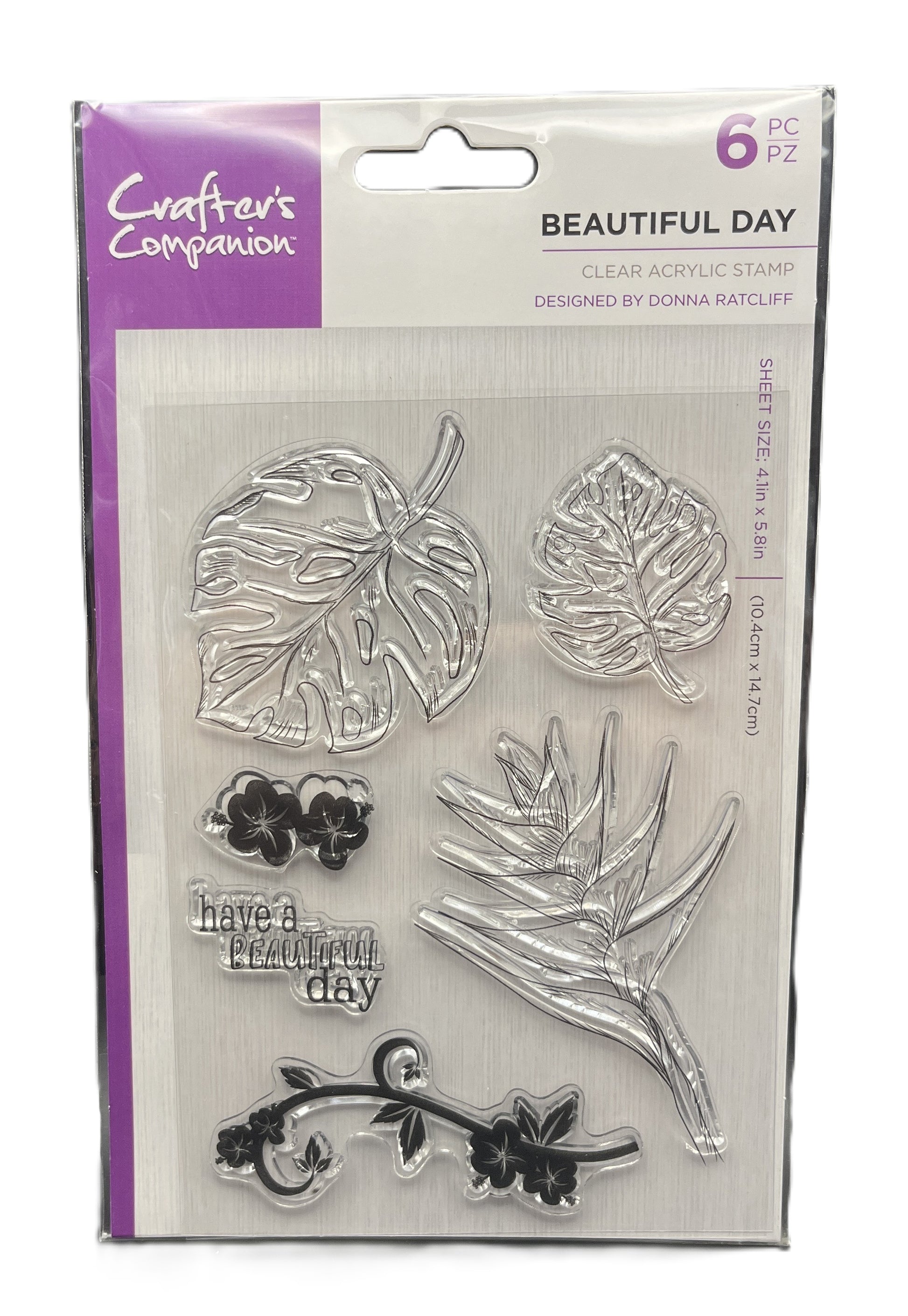 Packaging of clear acrylic stamps with leaf and floral designs, featuring 'Crafters Companion' branding.