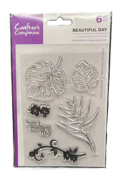 Packaging of clear acrylic stamps with leaf and floral designs, featuring 'Crafters Companion' branding.