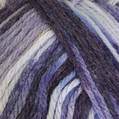 Close-up of multicolored yarn with shades of purple, blue, and gray.