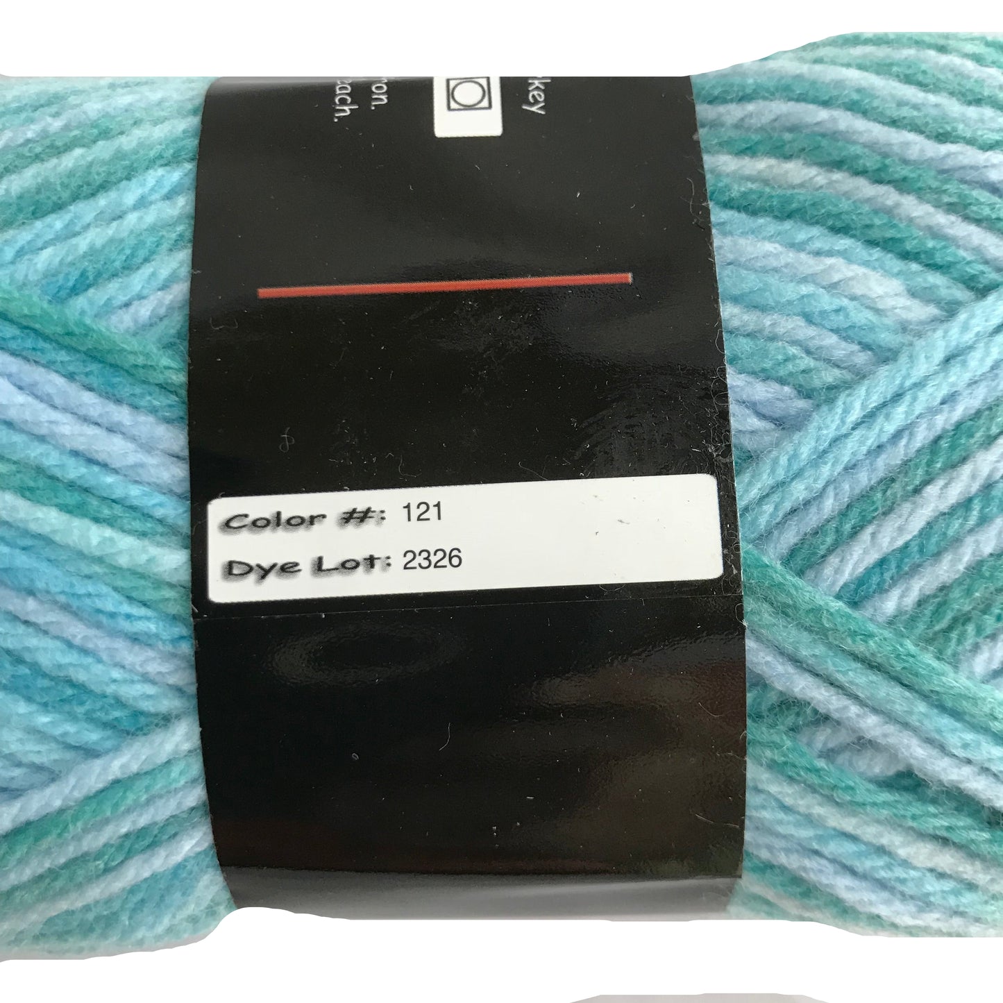 Yarn with a label showing color number 121 and dye lot 2326, against a light background.