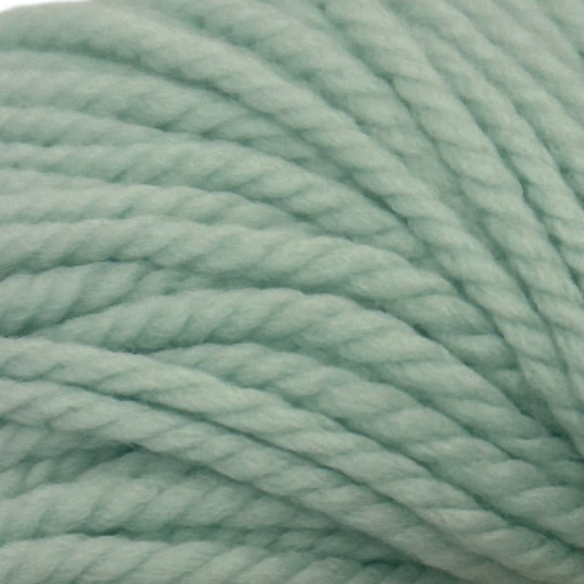Close-up of a ball of light green yarn