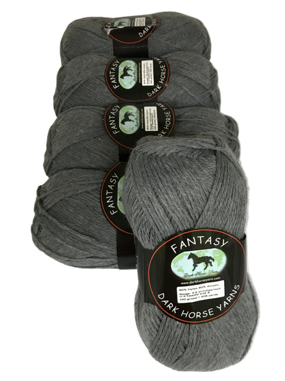 Three skeins of gray yarn with 'Fantasy' label on a white background