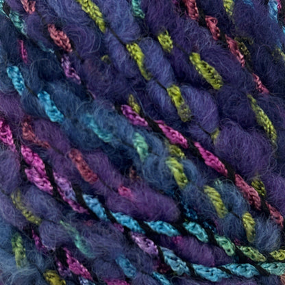 Close-up of multicolored yarn skeins with a purple hue.