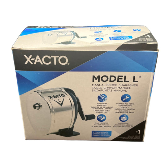 X-Acto knife set packaging on a dark surface