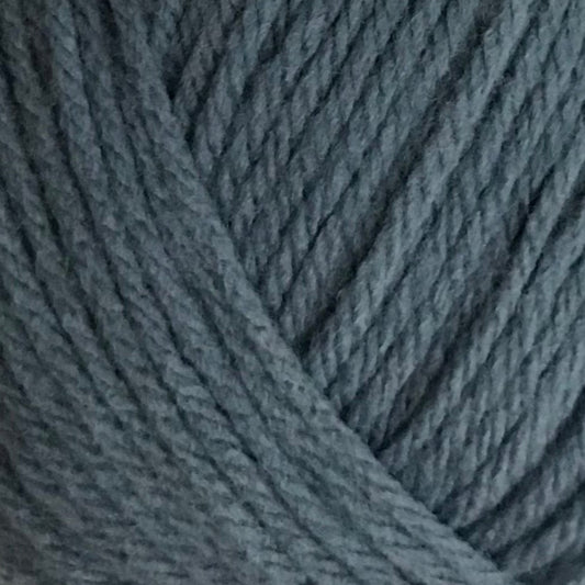 Blue skein of yarn with a label on a white background