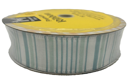Spool of striped ribbon with a yellow label on a white background