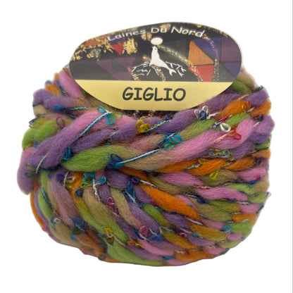 Multicolored yarn ball with 'Giglio' label on a white background