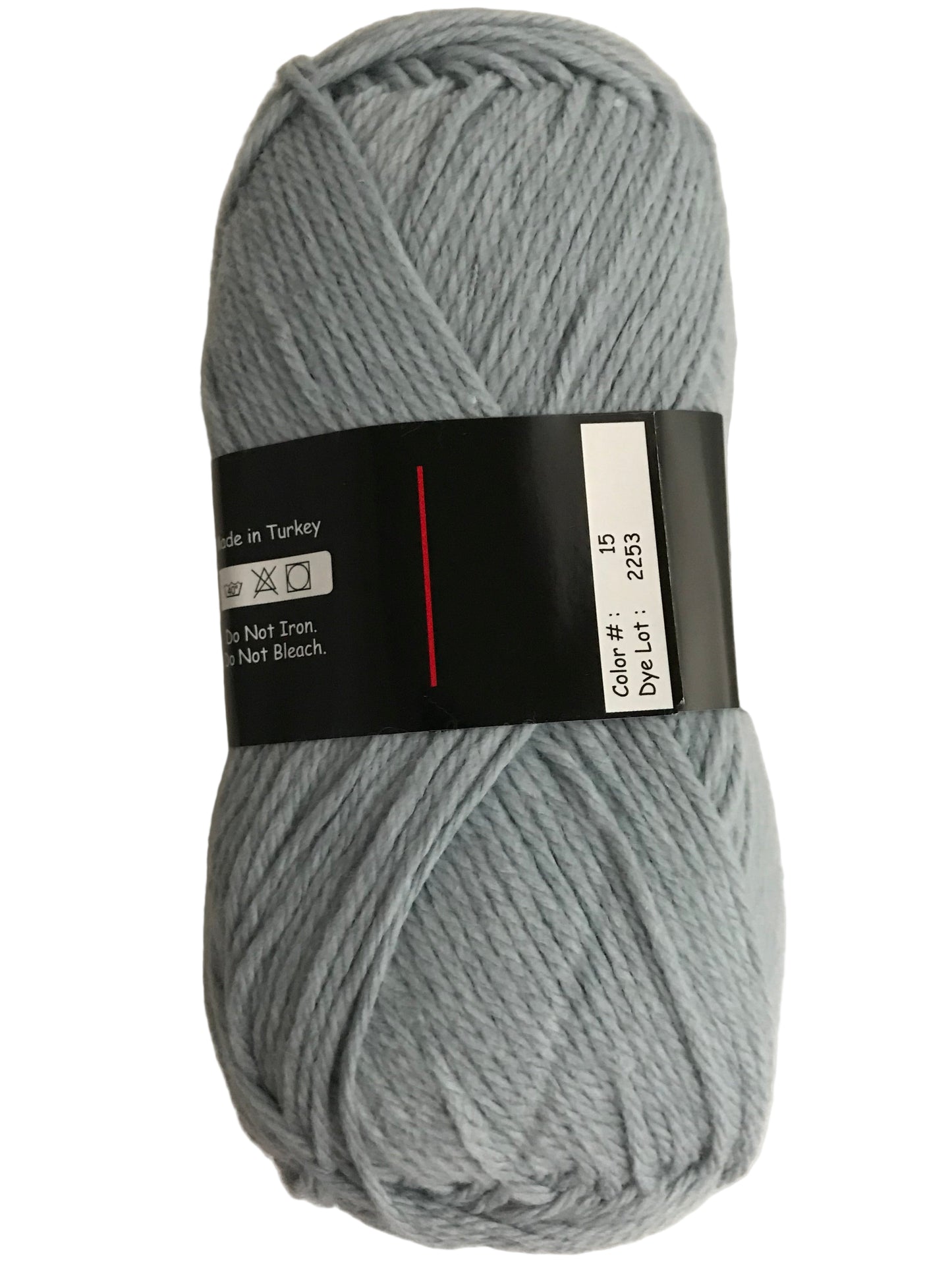 Gray skein of yarn with a label on a light gray background
