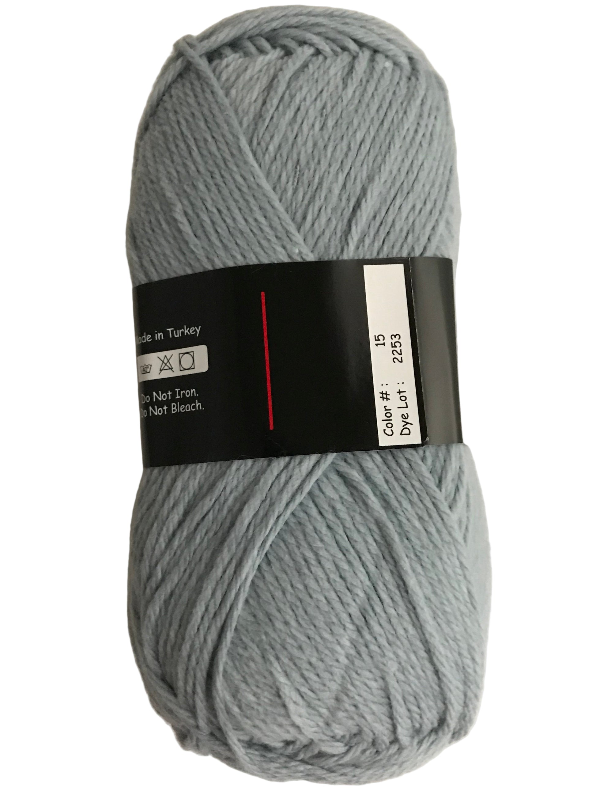 Gray skein of yarn with a label on a light gray background