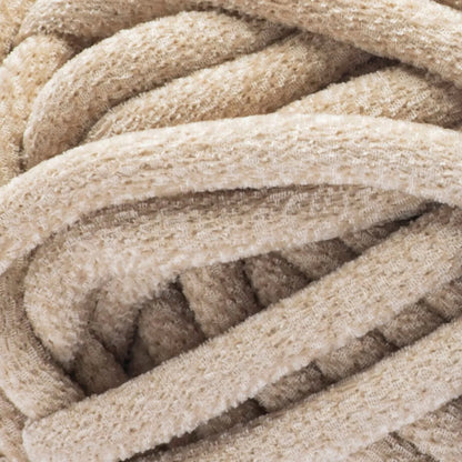Close-up of beige braided rope