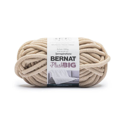Ball of Bernat Plush Big yarn with label on a white background