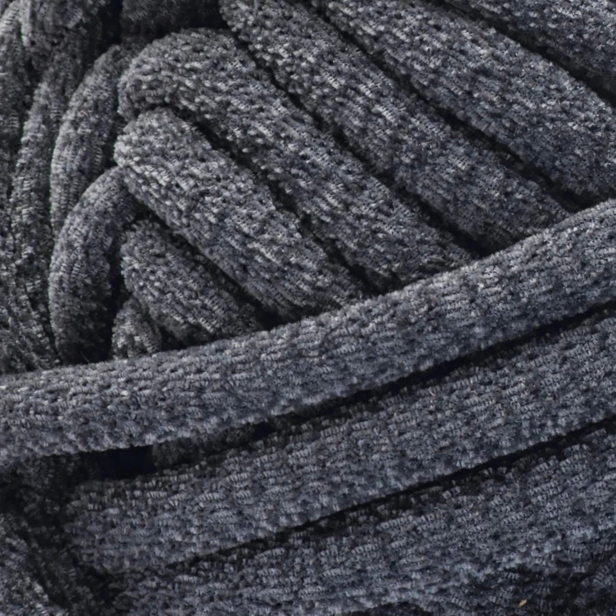 Close-up of a ball of dark gray yarn