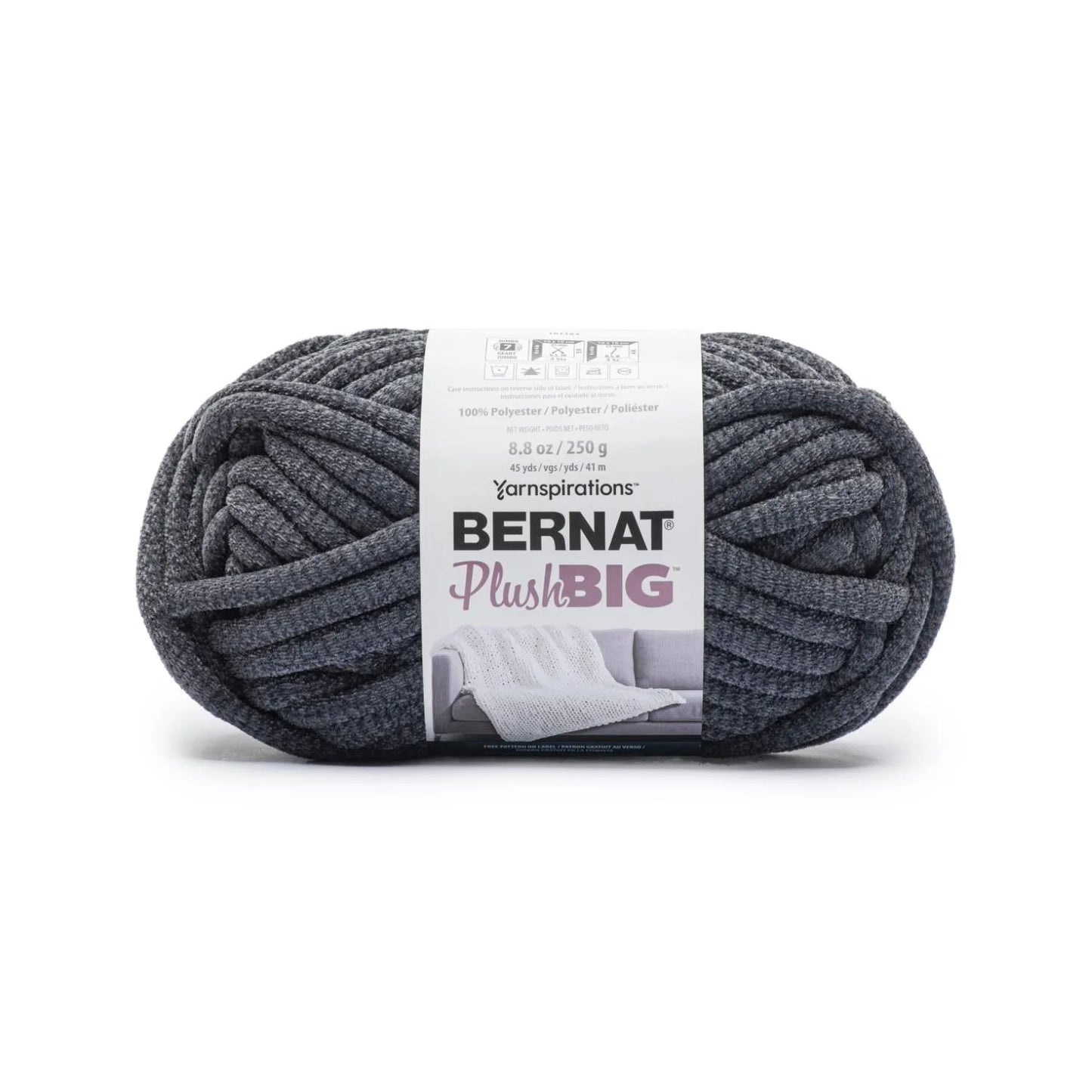 Ball of yarn with Bernat Plush Big label on a white background