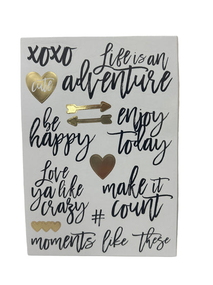 Decorative sign with motivational phrases and decorative elements on a white background