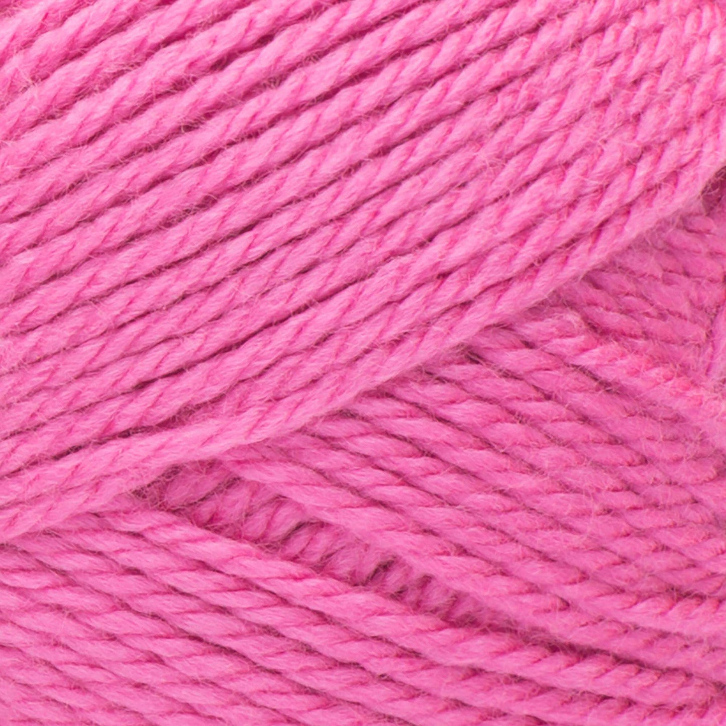 Close-up of pink yarn with a slight sheen