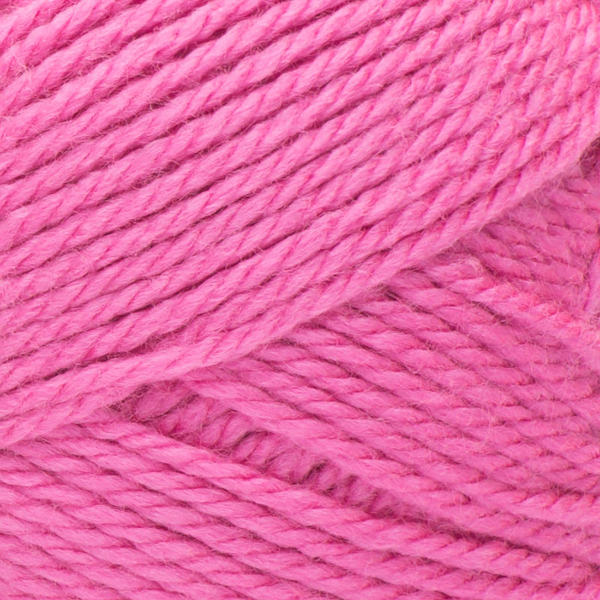 Close-up of pink yarn with a slight sheen