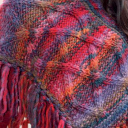 Close-up of a multicolored woven fabric with fringes