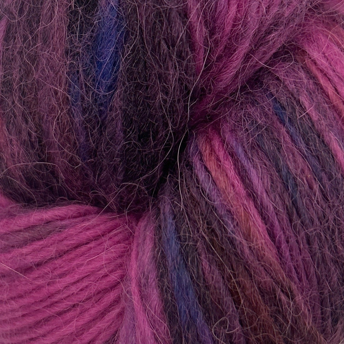 Close-up of a ball of pink and purple yarn