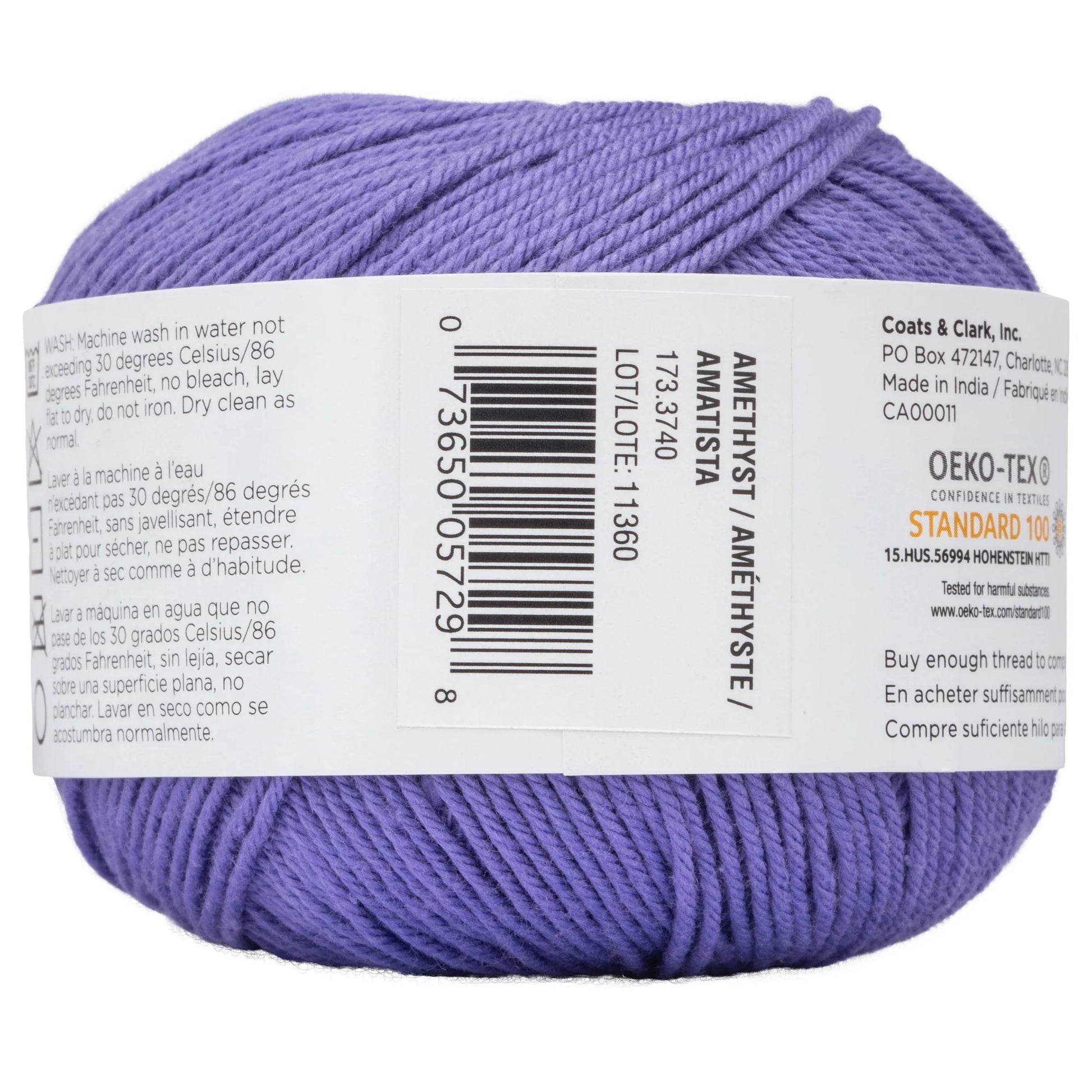 Purple yarn ball with label on a white background