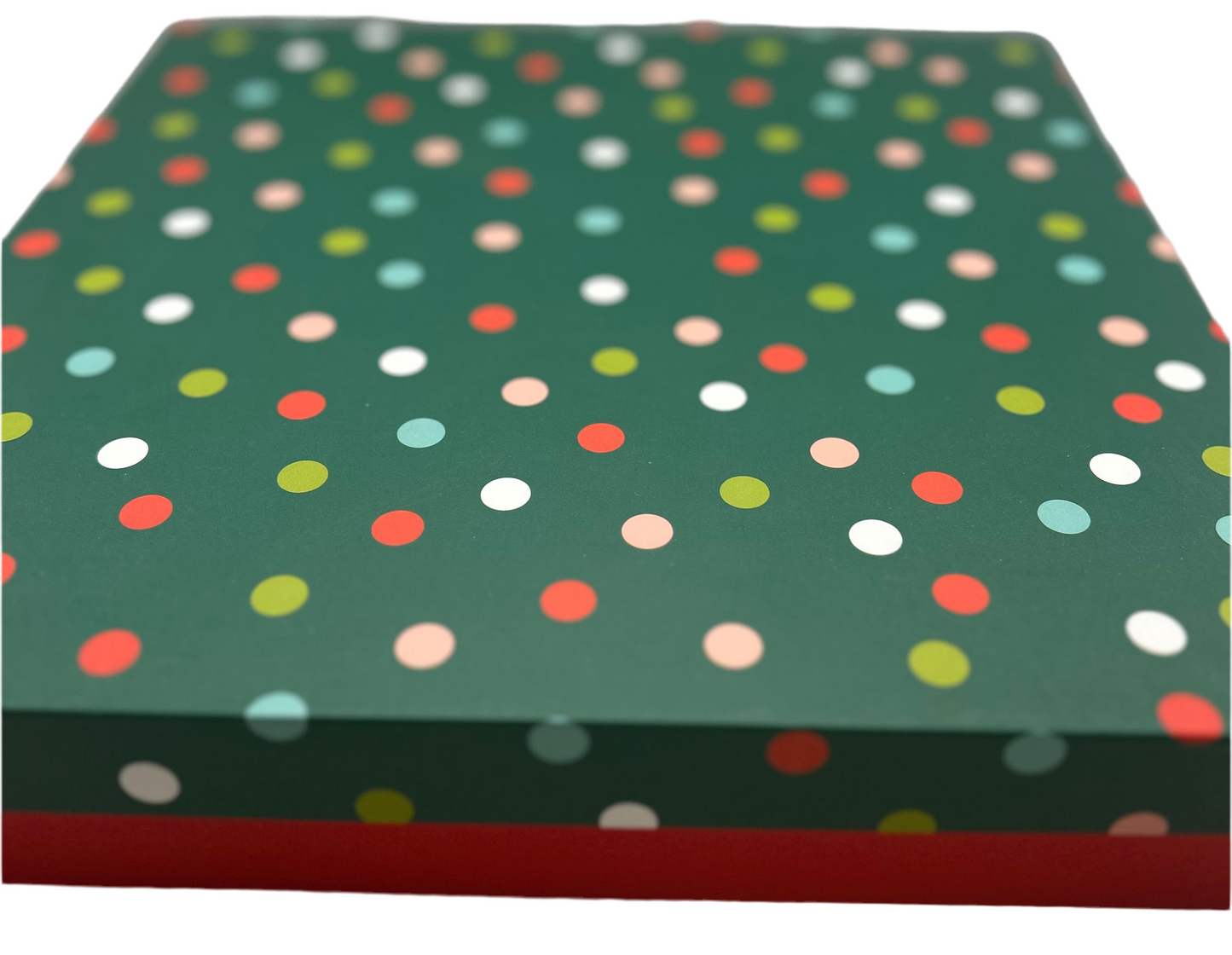 Colorful polka dot pattern on a green background