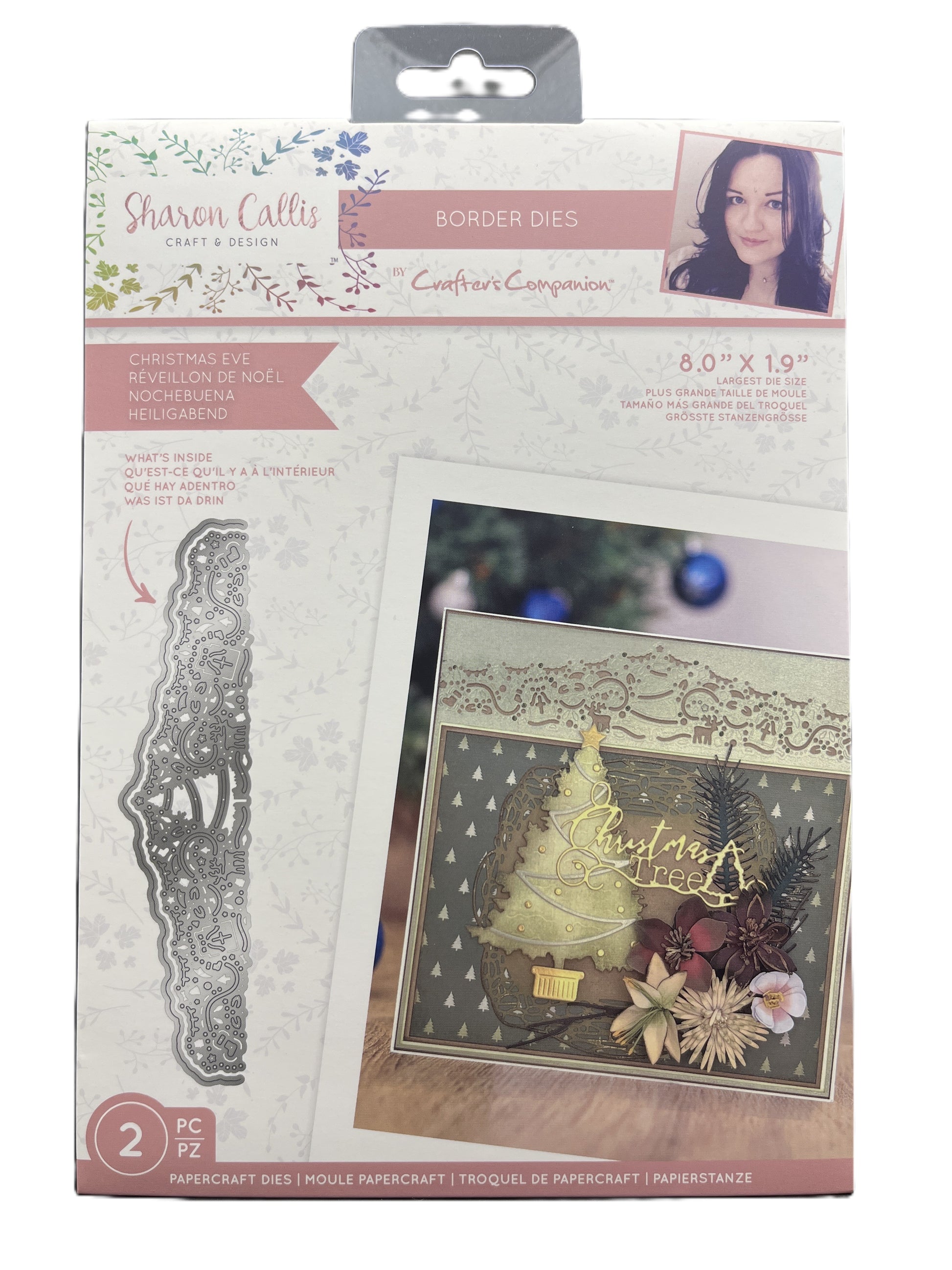 Packaged craft die set with a Christmas-themed card on the back