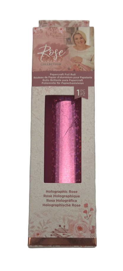 Pink roller with packaging featuring a woman and floral design on a light gray background