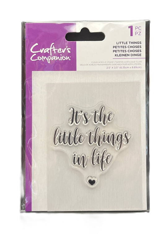 Packaged metal die with 'It's the little things in life' text and heart symbol, brand 'Crafters Companion' visible.