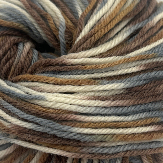Multicolored skein of yarn on a white background