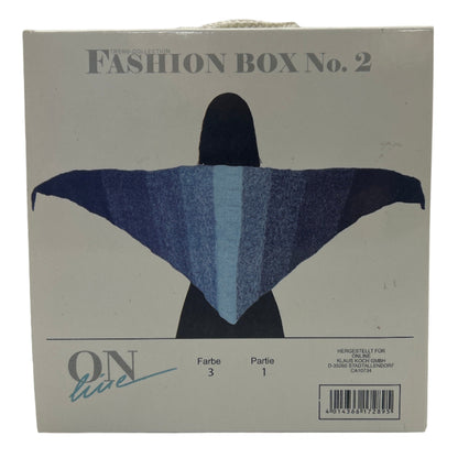 Fashion box with a blue and black pattern on a beige background