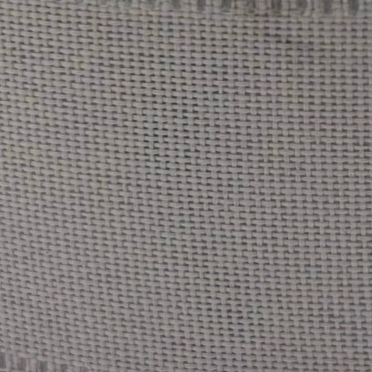 Spool of gray ribbon with a yellow label on a white background