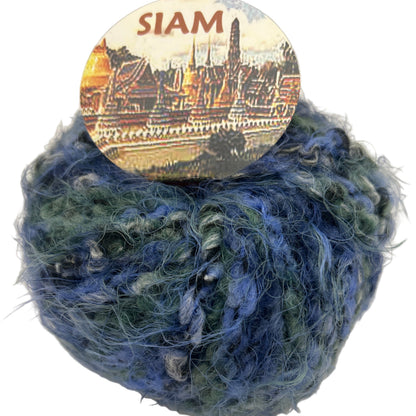 Ball of blue yarn with a 'SIAM' label on a white background